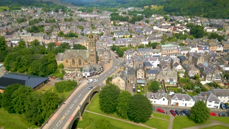 Aerial-Drone-shot-flying-from-the-Tweed-Bridge-towards-Peebles-Old-Parish-Church-in-the-town-of-Peebles-n-the-Scottish-Borders