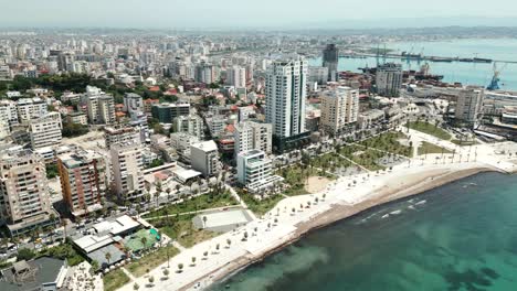 Durres,-city-buildings-along-the-Adriatic-Sea-coast,-aerial-view-from-a-drone