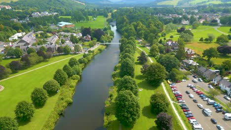 Aerial-Drone-shot-overflying-the-River-Tweed-at-Peebles-in-the-Scottish-Borders-heading-southeast-towards-Priorsford-Bridge