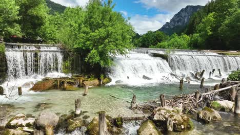 Slow-Motion-Natural-Waterfall-Landscape,-Savinja-River-Natural-Unpolluted-Park-in-Logar-Valley-at-Summer,-Travel-Destination