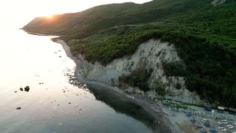 Beautiful-sunset-over-the-mountains-above-the-Adriatic-Sea,-aerial-view-from-a-drone