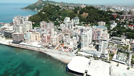 Durres,-city-buildings-and-Adriatic-Sea-beach,-aerial-view-from-a-drone