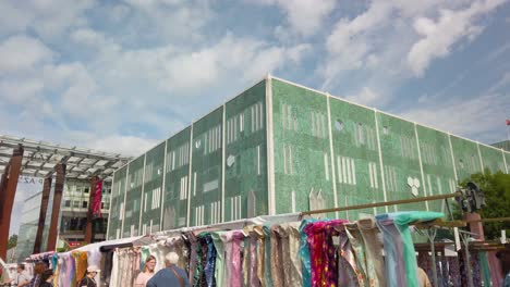 Textile-Stalls-Outside-The-De-Bijenkorf-Eindhoven-Department-Store-In-Eindhoven,-Netherlands