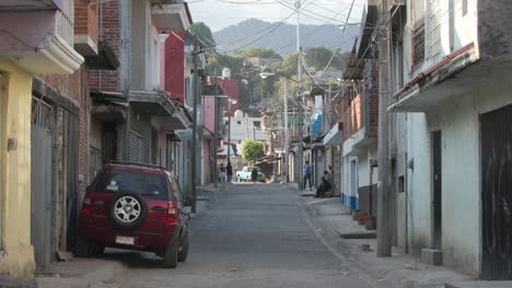 a-small,-narrow,-empty-street-in-Uruapan-in-Mexico