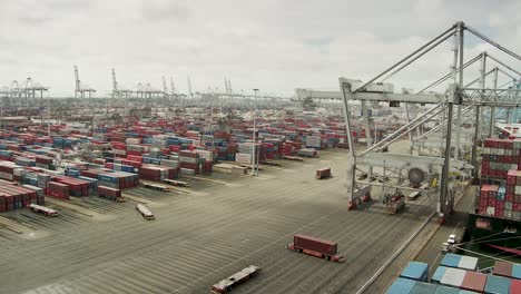Wide-shot-of-busy-international-container-freight-port,-hustle-and-bustle