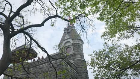 Looking-Up-At-Belvedere-Castle-In-Central-Park-New-York-Through-Tree-Branches