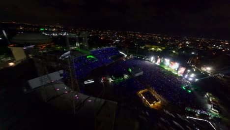 Quisqueya-Stadium-In-Full-Capacity-At-Night-During-Concert-Show-Of-Urban-Reggaeton-Singer-Arcangel-In-Santo-Domingo,-Dominican-Republic