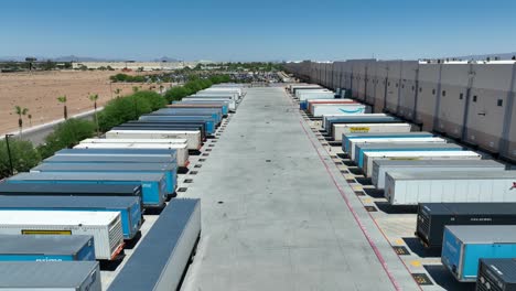 Warehouse-distribution-center-parking-lot-full-of-truck-trailers