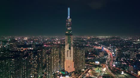 Drone-View-Landmark-81-Tower-En-La-Noche---Ciudad-Ho-Chi-Minh,-Vietnam-Del-Sur
