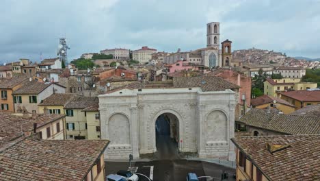 Aerial-over-the-Saint-Pietro-Gate-and-the-town-of-Borgo-XX-Giugno,-Perugia,-Province-of-Perugia,-Italy