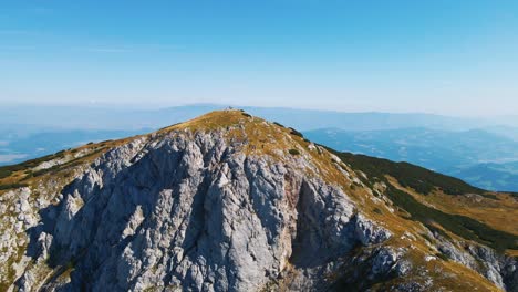 Stunning-4K-drone-footage-of-Saddle-bellow-Kordezeva-Glava---Peca-mountain-in-Karavanke-mountain-range