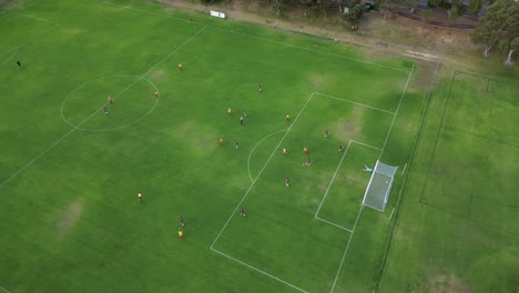 Cinematic-drone-shot-of-soccer-team-scored-a-spectacular-bicycle-kick-goal-during-amateur-match-in-Australia---orbiting-shot