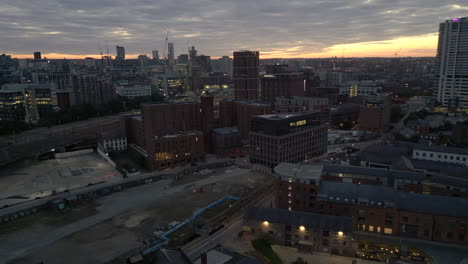 Rising-Establishing-Drone-Shot-Over-outskirts-of-Leeds-City-Centre-and-Bridgewater-Place-in-Low-Light-Before-Sunrise