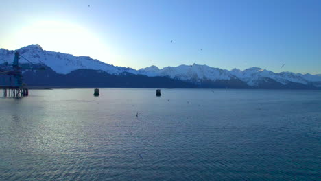 Seward-Alaska-mountains-at-sunrise-with-sea-birds