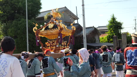 Omikoshi-portable-shrine-at-small-local-Japanese-summer-matsuri-festival