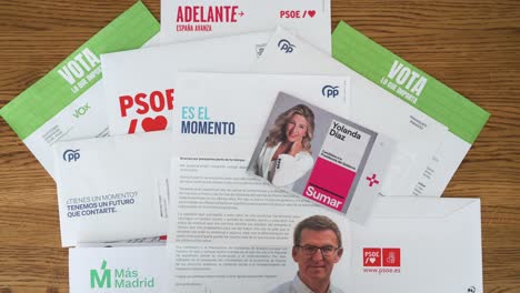 Spanish-political-party-ballots-from-the-People's-Party-,-far-right-party-VOX,-and-Sumar-requesting-citizens-to-vote-in-the-2023-Spanish-General-Election