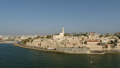 Aerial-view-of-Jaffa-old-city-port-and-marina-coastline-with-general-view-of-both-Jaffa-and-Tel-Aviv