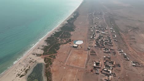 Aerial-View-Of-Soccer-Field-Near-The-Coastal-Town-In-Socotra-Island-In-Yemen