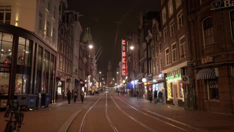 Reguliersbreestraat--at-night-time-with-people-walking-around