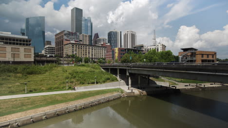 Bicycle-Passes-Through-Park-Along-River-in-Houston,-Texas,-USA-on-Summer-Day