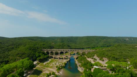 Beautiful-aerial-landscape-view-of-the-Pont-du-Gard-bridge-and-Gordon-river-in-southern-France