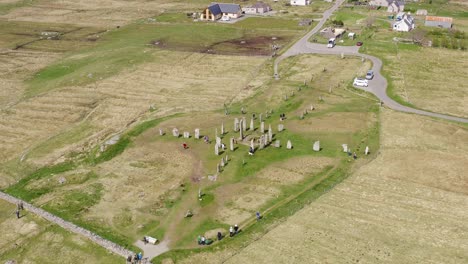 Medium-close-up-drone-shot-of-the-Callanish-Standing-Stones-on-the-Isle-of-Lewis,-part-of-the-Outer-Hebrides-of-Scotland