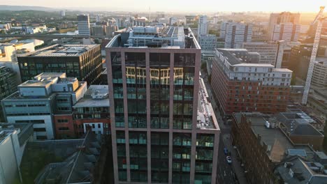 A-180-degree-pan-at-sunset-of-Glasgow's-new-office-building-located-on-Argyle-Street,-near-Glasgow-Central-Station