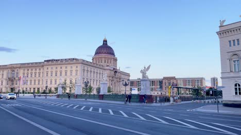 Impressive-Berlin-Palace-in-Capital-of-Germany-next-to-Traffic-at-Sundown