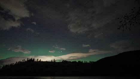 Aurora's-ethereal-dance-above-tranquil-lake