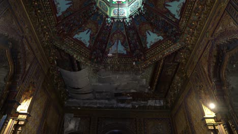 Tilt-down-form-majestic-Alhambra-Palace-Ceiling-to-visitors-taking-photos-in-Heritage-Day-2023,-Santiago