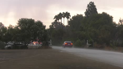 Car-drives-through-flooded-waters