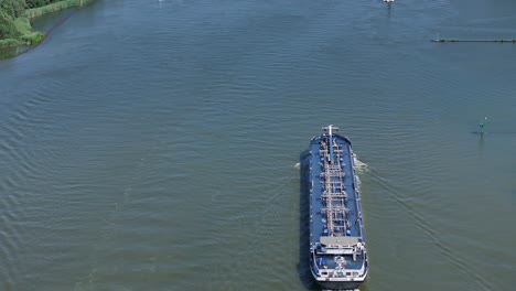 Industrial-Barge-Voyage:-Drone-Panning-Down-River-View-from-Wekendam-to-Antwerpen