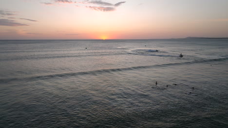 Feel-the-thrill-as-two-jet-skis-dance-on-the-waves-at-a-breathtaking-sunset-off-the-shores-of-Punta-del-Este,-Uruguay