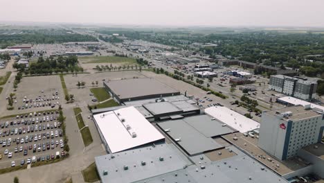 A-4K-Aerial-Time-Lapse-Cinematic-Drone-Shot-of-Busy-City-18th-Street-Downtown-Westoba-Place-Keystone-Center-Stadium-Wheat-Kings-Hockey-Arena-in-Prairies-Town-Brandon-Manitoba-Canada