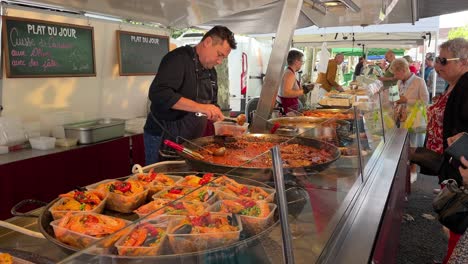 Stall-selling-chicken-leg-and-shrimp-fried-rice-at-the-market-in-France