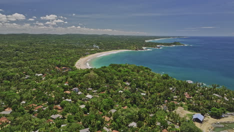 Gandara-Sri-Lanka-Aerial-v4-drone-flyover-Thalalla-residential-neighborhood-towards-Talalla-beach-capturing-beautiful-sand-beach-and-Indian-ocean-views-in-summer---Shot-with-Mavic-3-Cine---April-2023