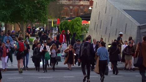 Static-shot-capturing-large-crowds-of-people-crossing-the-road-on-Adelaide-street-and-Albert-street-between-Queen-street-mall-and-King-George-square,-downtown-Brisbane-city,-central-business-district