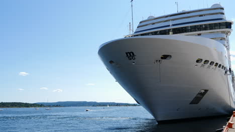 Mooring-Ropes-Getting-Retracted,-Bow-of-MSC-Cruise-Ship-Ocean-Liner