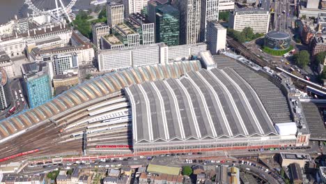 Aerial-view-of-Waterloo-Station,-River-Thames-and-the-London-Eye