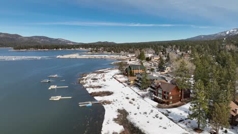 Lake-view-with-mountains-snow-woods-and-some-buldings-at-Big-Bear-Mountain-CA-part-2