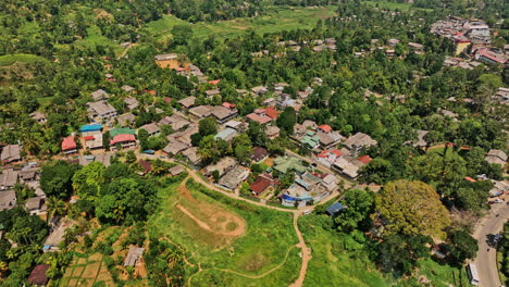 Pussellawa-Sri-Lanka-Aerial-v2-cinematic-birds-eye-view-drone-flyover-hilly-landscape-around-mountain-village-town-along-A5-road-capturing-highland-tea-plantation---Shot-with-Mavic-3-Cine---April-2023