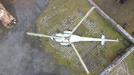 Soaring-drone-shot-from-a-helicopter-at-a-military-open-air-museum-in-Poland