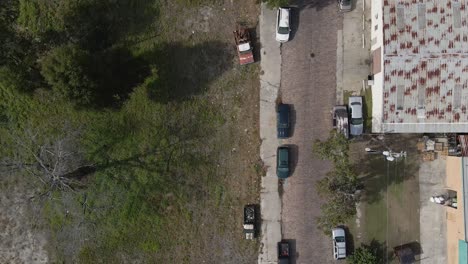 top-down-drone-shot-of-a-run-down-mixed-use-suburban-rural-poor-neighborhood-in-the-american-south
