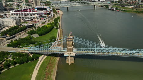 Aerial-view-of-the-suspension-bridge-and-Great-American-Ballpark-in-Cincinnati,-Ohio