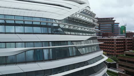 Aerial-close-up-of-the-Innovation-Tower-housing-the-Hong-Kong-Polytechnic-University-,-Hong-Kong,-China