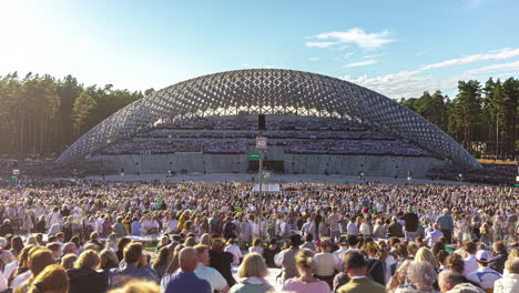 Timelapse-of-people-filling-into-amphitheater-at-latvian-song-and-dance-festival