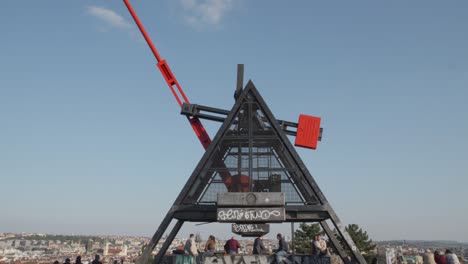 a-large,-metronome-located-in-Letná-Park,-overlooking-the-Vltava-River-and-the-city-center-of-Prague