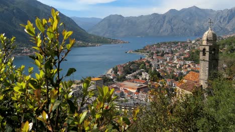 Kotor-Bay,-Church-of-Our-Lady-of-Remedy,-Kotor-Town,-reveal-shot,-Montenegro