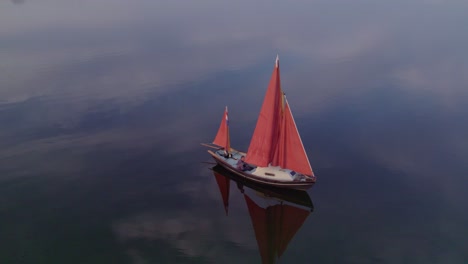 Wide-shot-of-Sailboat-anchored-at-Lauwersmeer-Friesland,-aerial