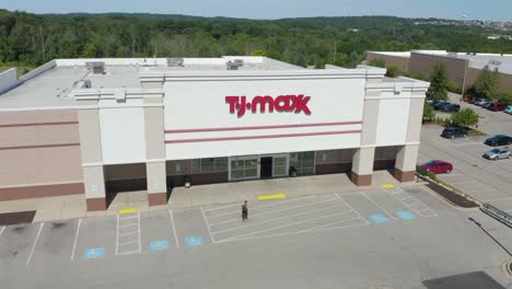 Aerial-Tracking-Shot-of-Customer-Walking-into-TJ-Maxx-Retail-Store